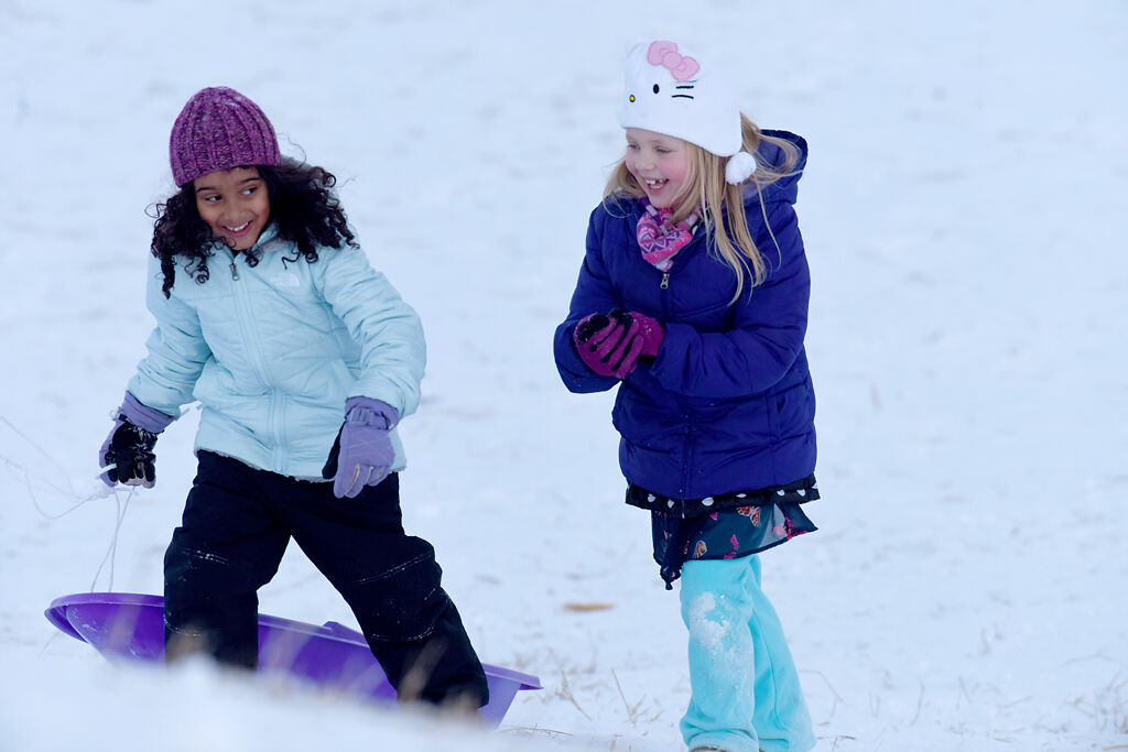 Arabella Peters, left, 6, laughs